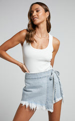 Ellyza Skort - Recycled Cotton Frayed Edge Wrap Denim Skort in Mid Blue Wash