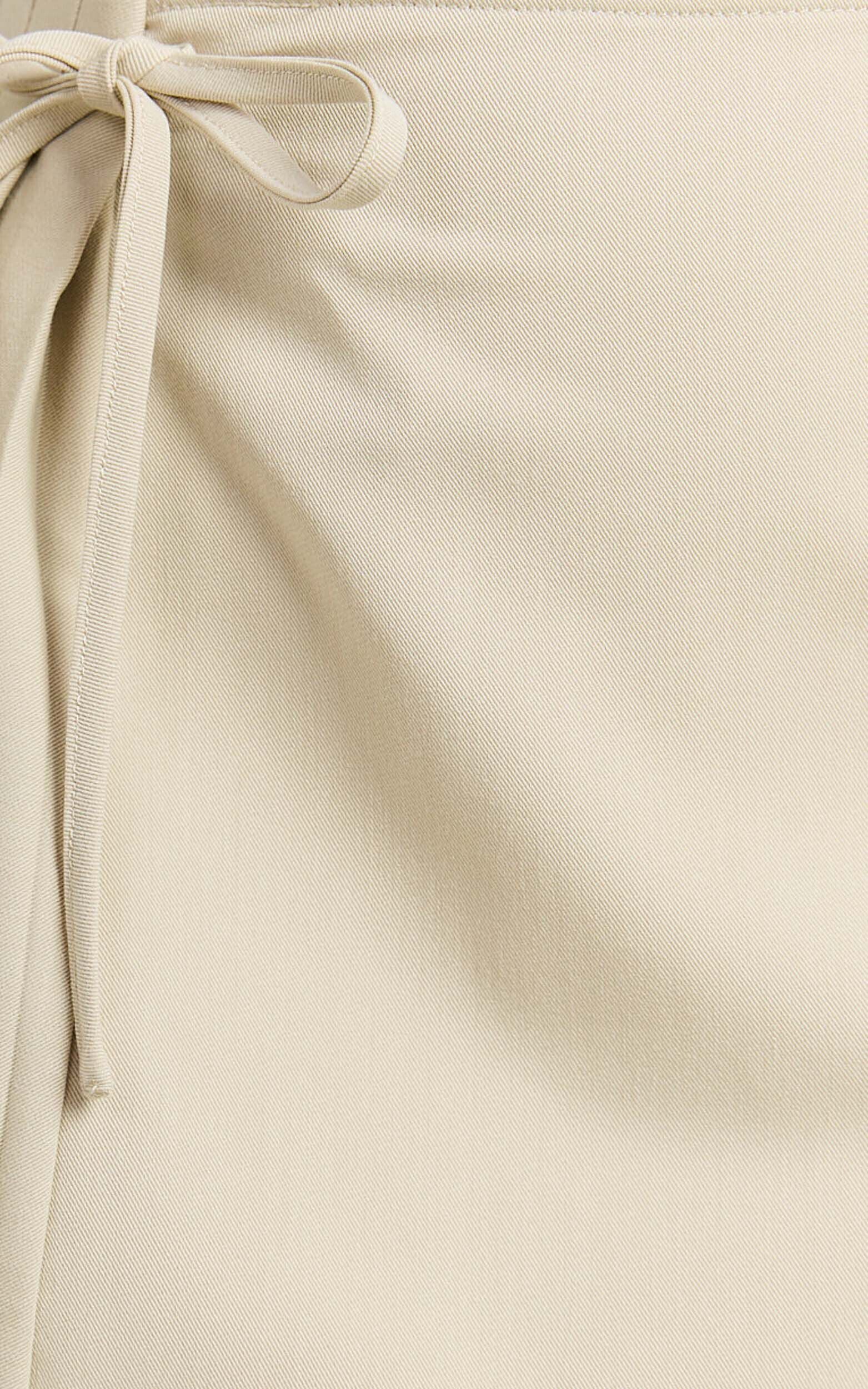 Camilla Mini Skirt - Mid Waist Pleated Back Bow Detail Skirt in Stone