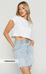 Pieta Mini Skirt - Recycled Cotton Raw Hem Denim Skirt in Mid Blue Wash
